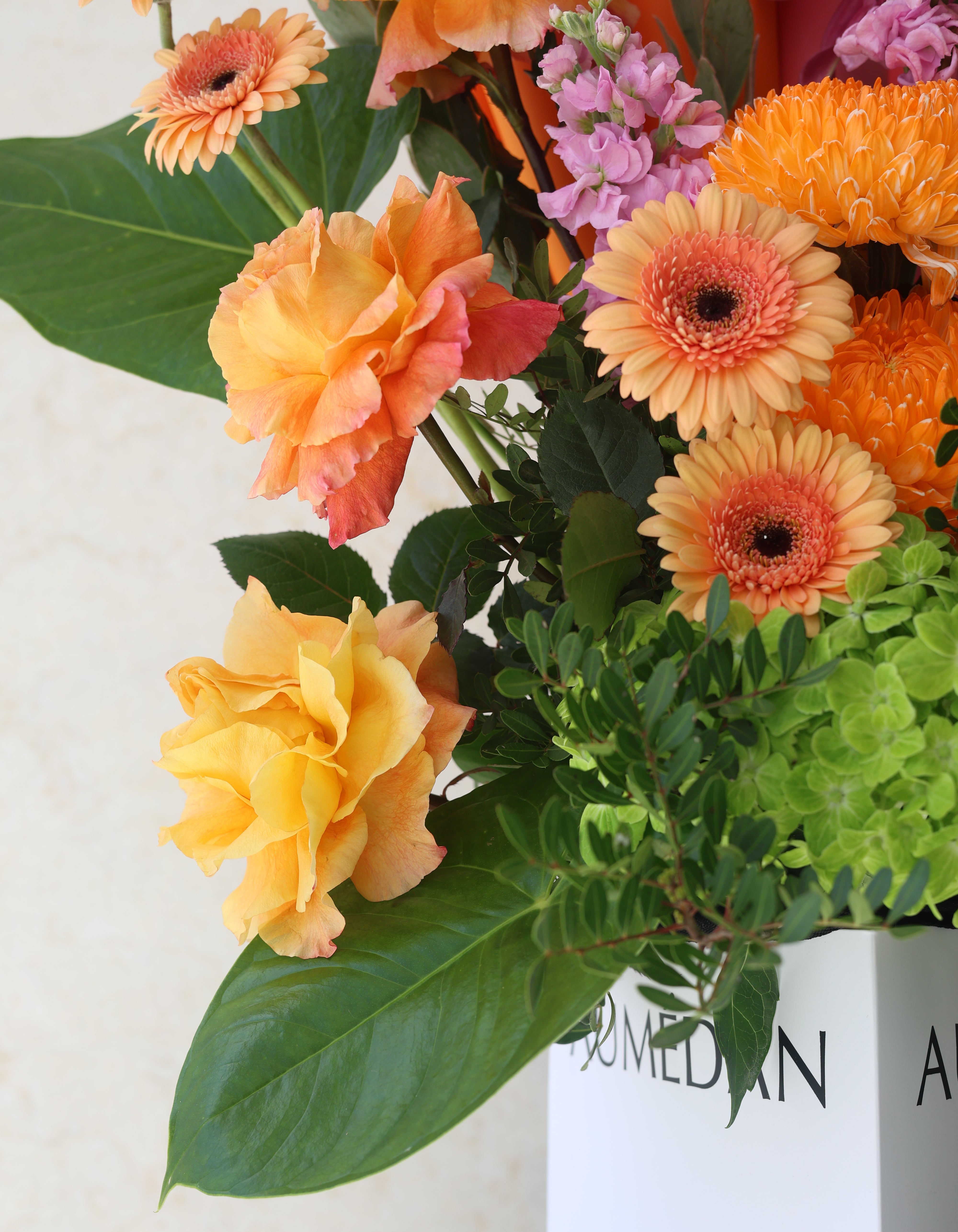SUMMER BLOSSOMS - TRITOTE BAG ARRANGEMENT