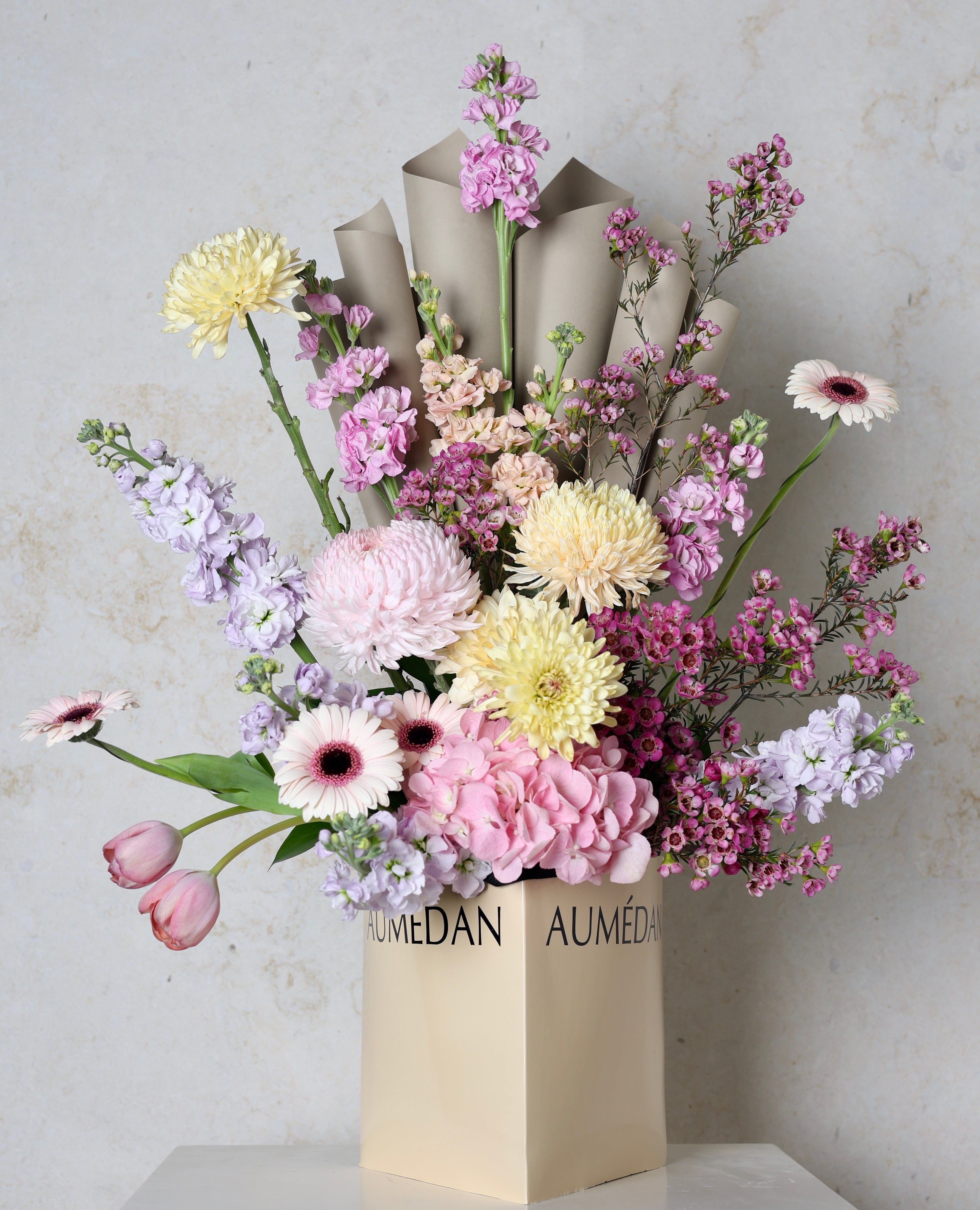 PASTAL BLOOM - TRITOTE BAG ARRANGEMENT