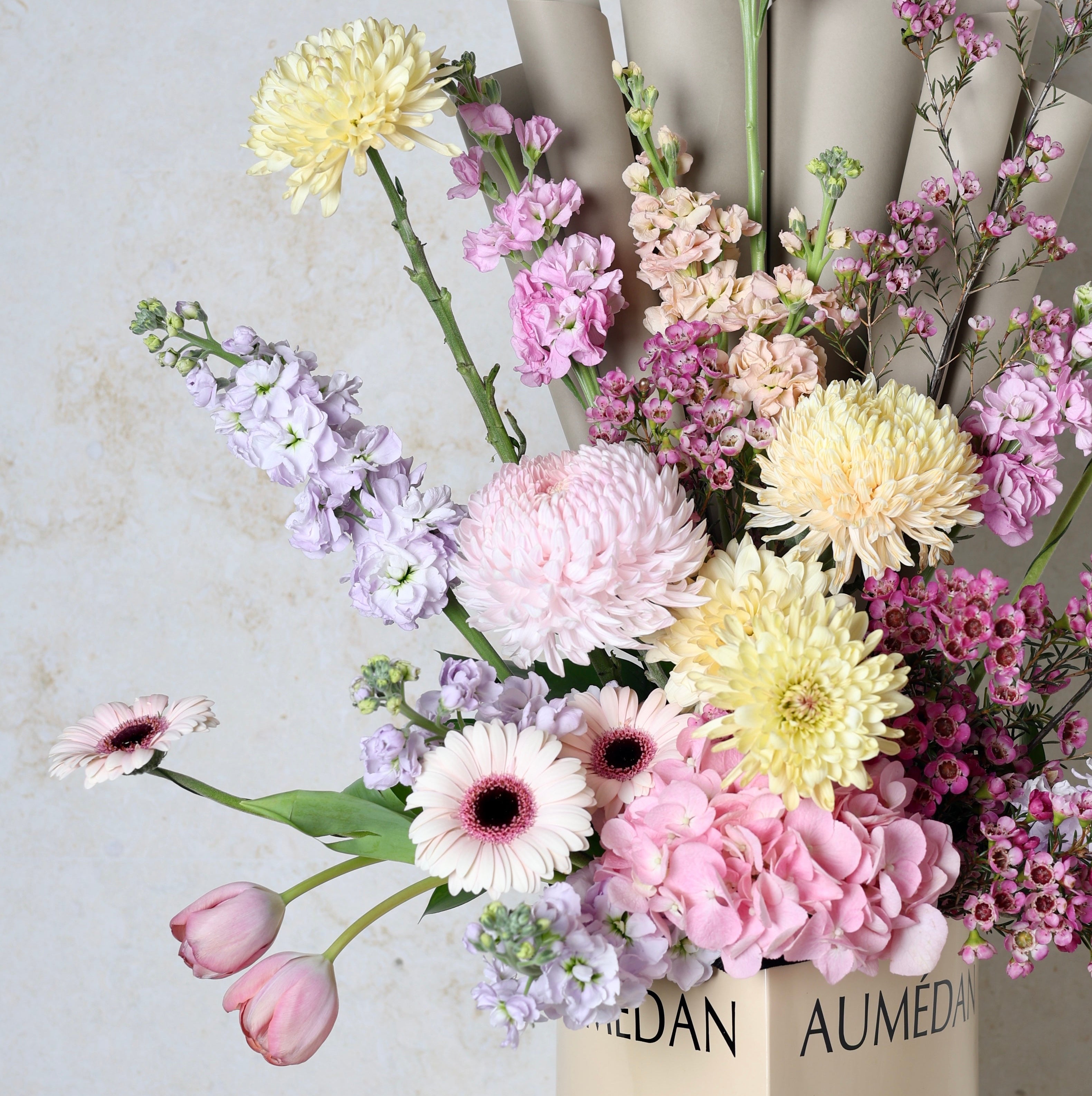 PASTAL BLOOM - TRITOTE BAG ARRANGEMENT