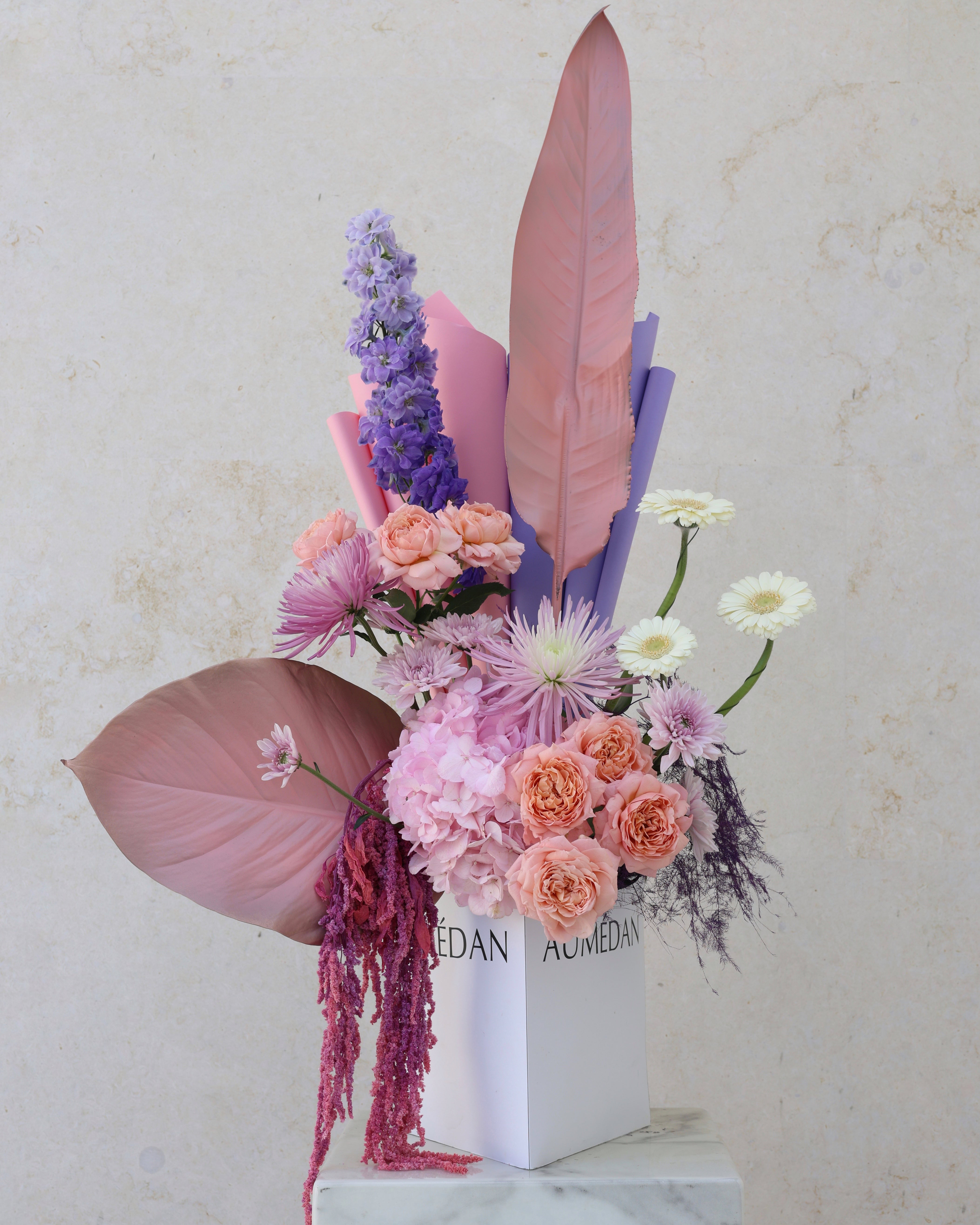 SUGAR PLUM BLOOM - TRITOTE BAG ARRANGEMENT