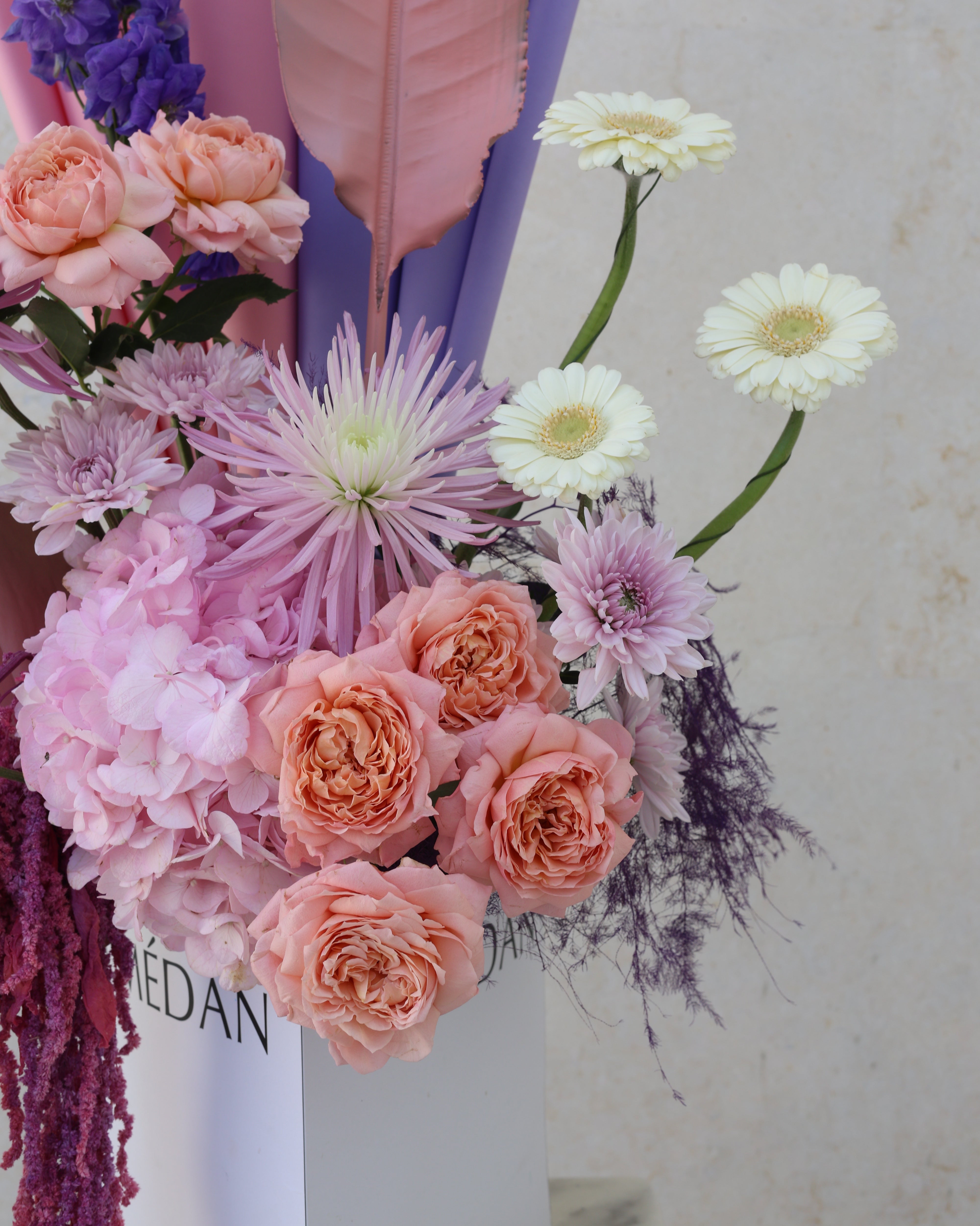 SUGAR PLUM BLOOM - TRITOTE BAG ARRANGEMENT