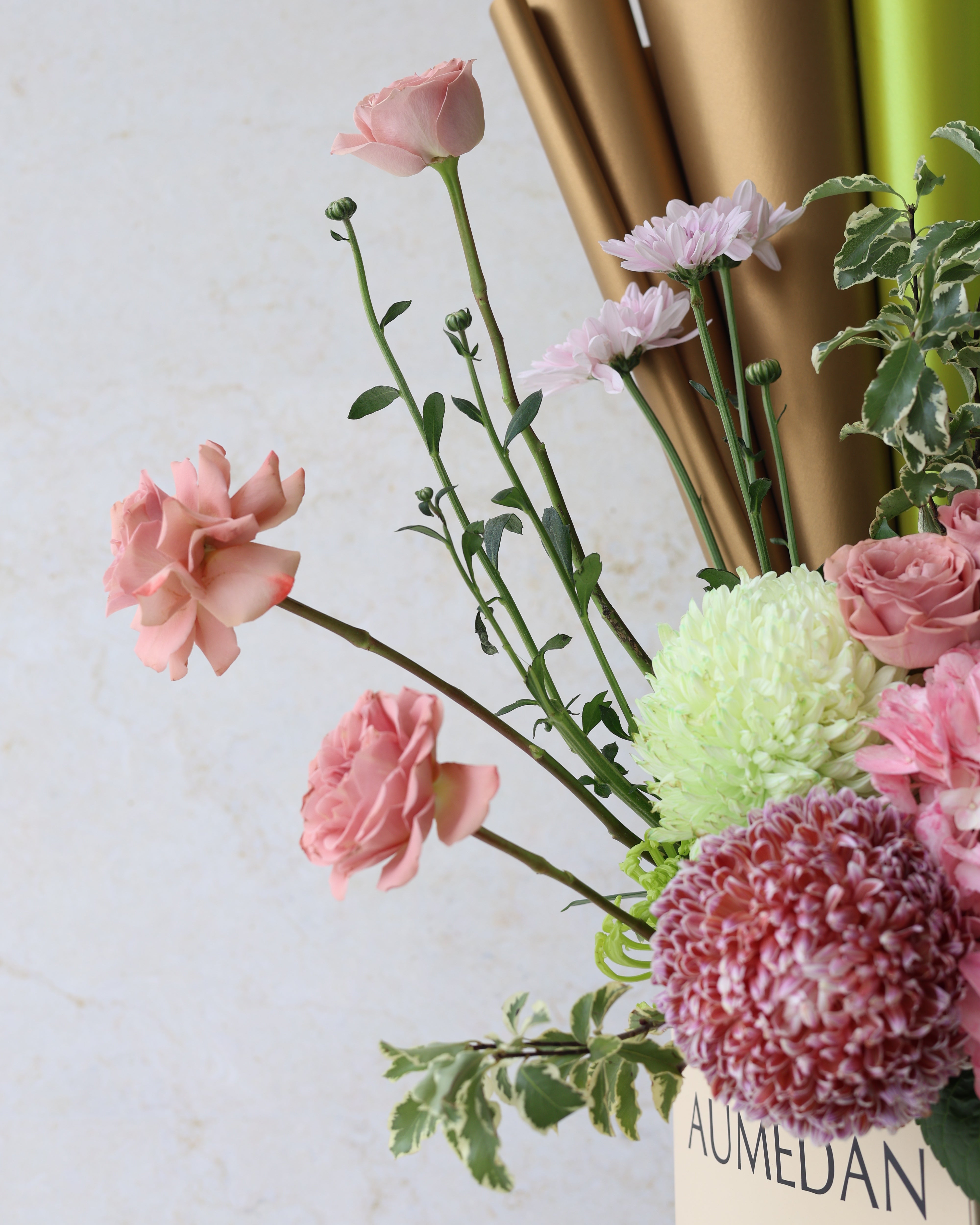 VERDANT GLOW - TRITOTE BAG ARRANGEMENT