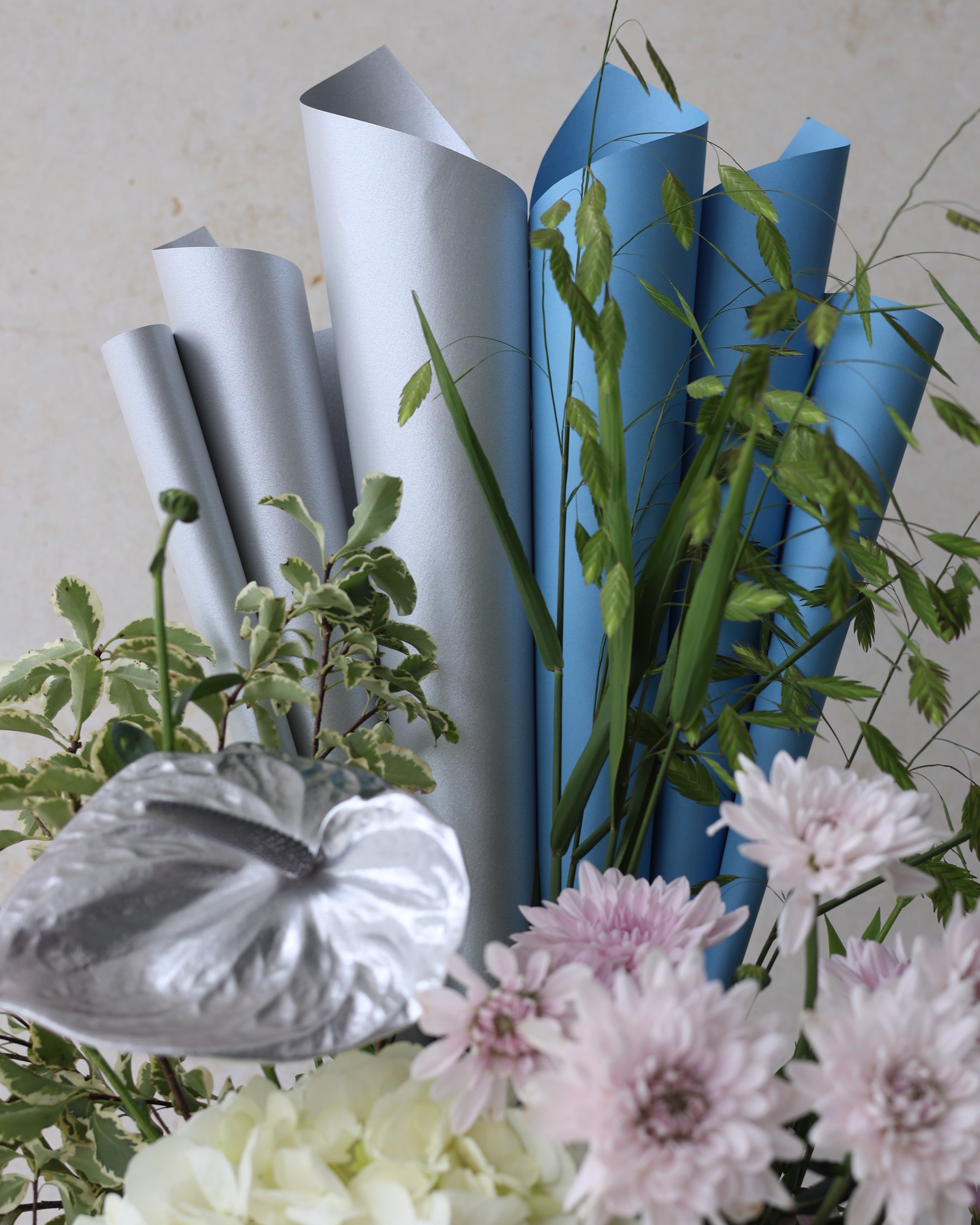 CLESTIAL GLOW - TRITOTE BAG ARRANGEMENT